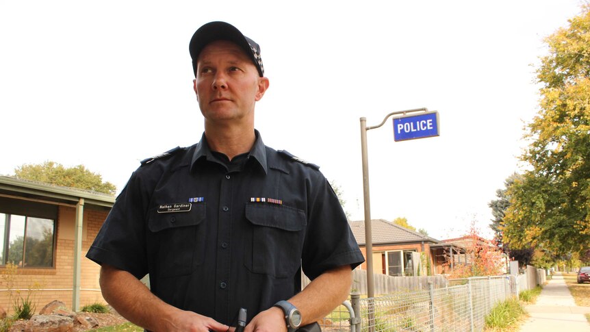 Trentham police sergeant Nathan Gardiner outside the town's small police station north-east of Ballarat.