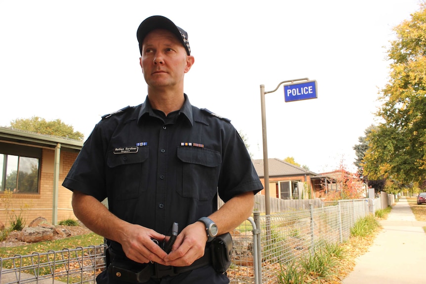 Trentham police sergeant Nathan Gardiner outside the town's small police station north-east of Ballarat.