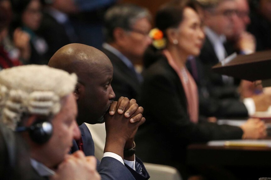 Gambia's Justice Minister Abubacarr Tambadou and Myanmar's leader Aung San Suu Kyi in court room.