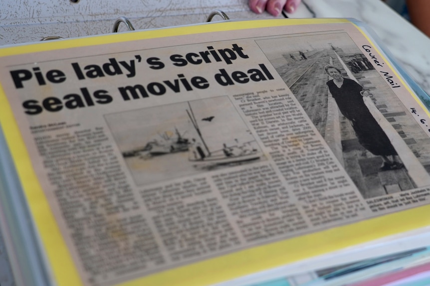 A newspaper clipping with the headline 'Pie lady's script seals movie deal'