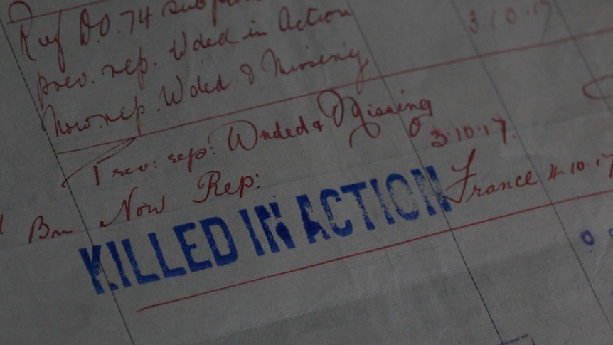 Paperwork showing the words "killed in action".