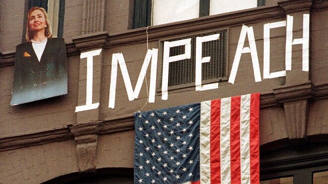 The word "impeach" appears on a Park Avenue building in New York September 14, 1998.