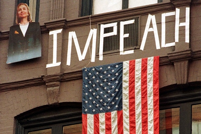 The word "impeach" appears on a Park Avenue building in New York September 14, 1998.