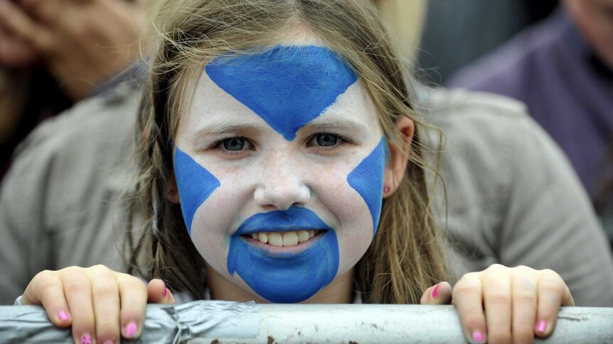 Girl with face painted with Scottish flag, Sep 21 2013