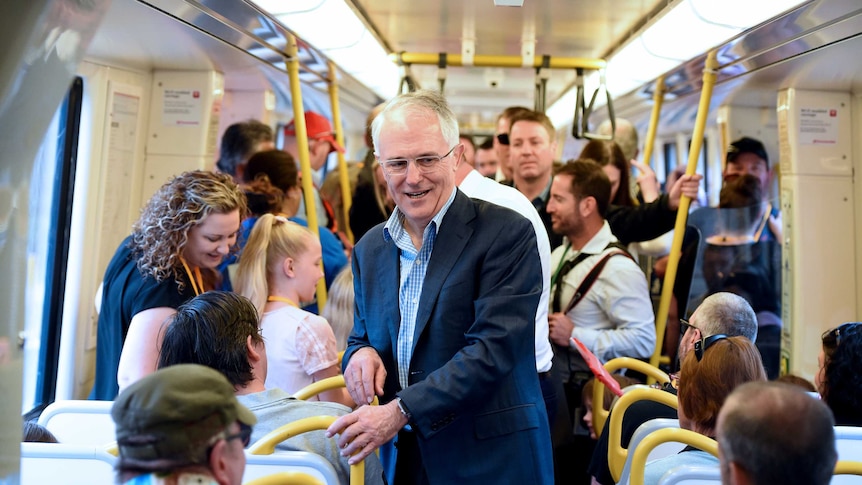 Australian Prime Minister Malcolm Turnbull meets passengers