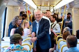 Australian Prime Minister Malcolm Turnbull meets passengers
