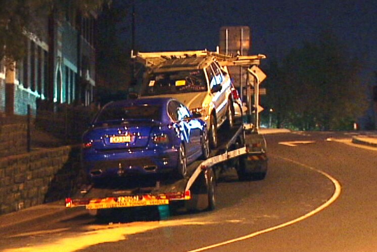 Two of the cars that remained on the truck were substantially damaged.