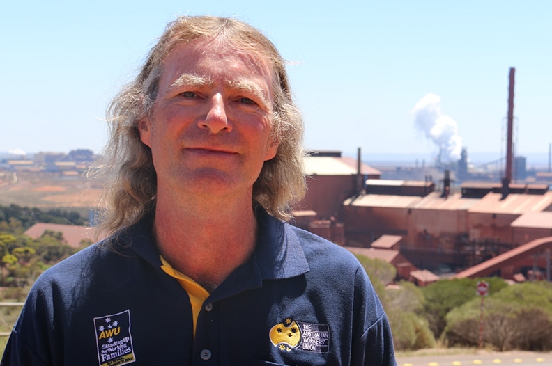 Arrium worker Marty Hilton stands in front of the steelworks in Whyalla