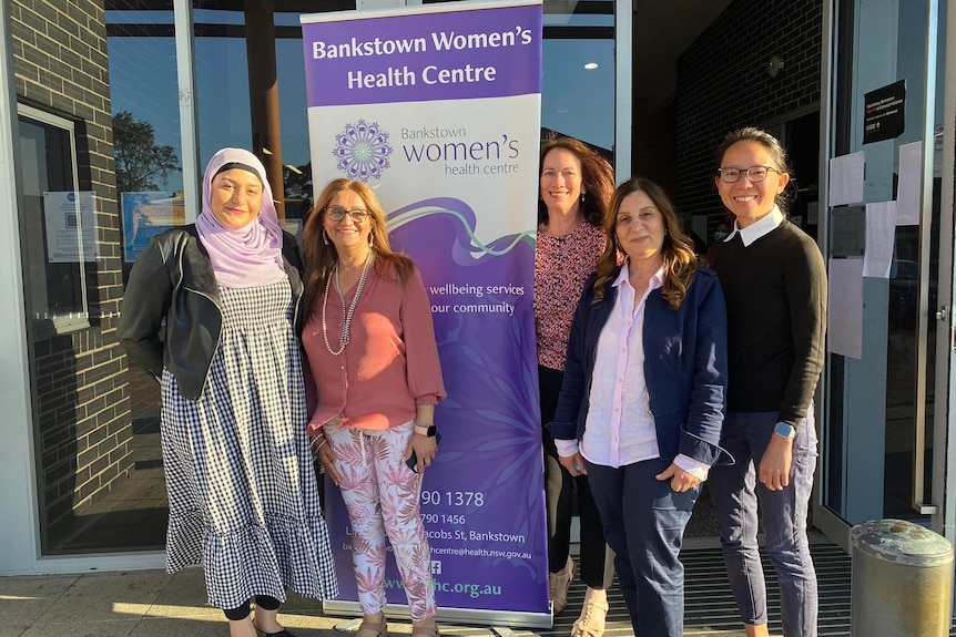 Group of women outside building