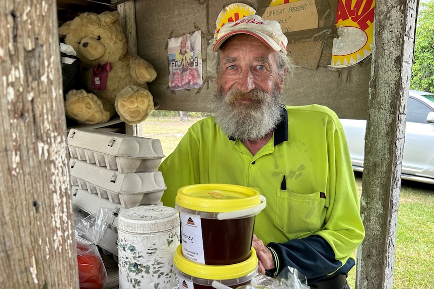 Man with beard at fruit stand