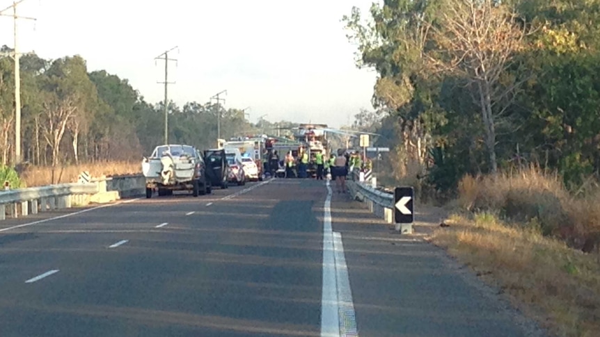 A helicopter at the scene of a car accident on the Bruce Highway at Bluewater.