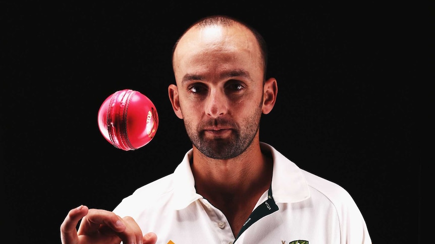 Nathan Lyon with a pink ball