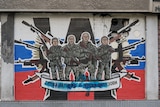 A mural depicting the Wagner Group painted on a building in Belgrade, Serbia