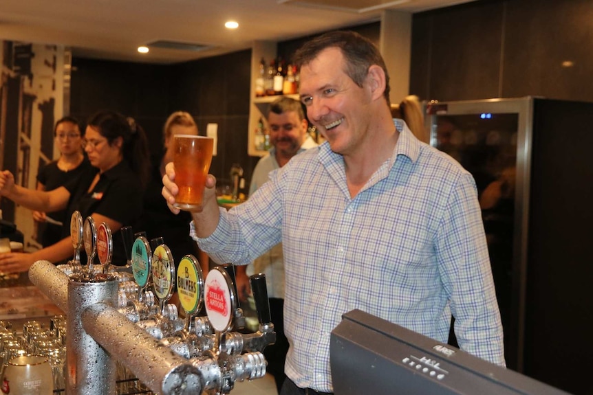 Michael Gunner with a beer