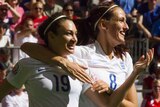 Jodie Taylor celebrates her goal against Canada