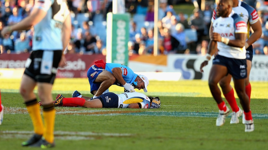 Costly incident ... Johnathan Thurston lies on the ground after being tackled by Ben Pomeroy
