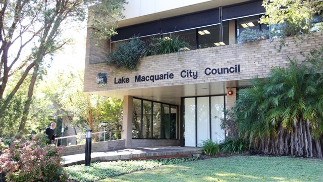 Rousing applause at last night's meeting of Lake Macquarie Council for the city's first female mayor, Jodie Harrison.
