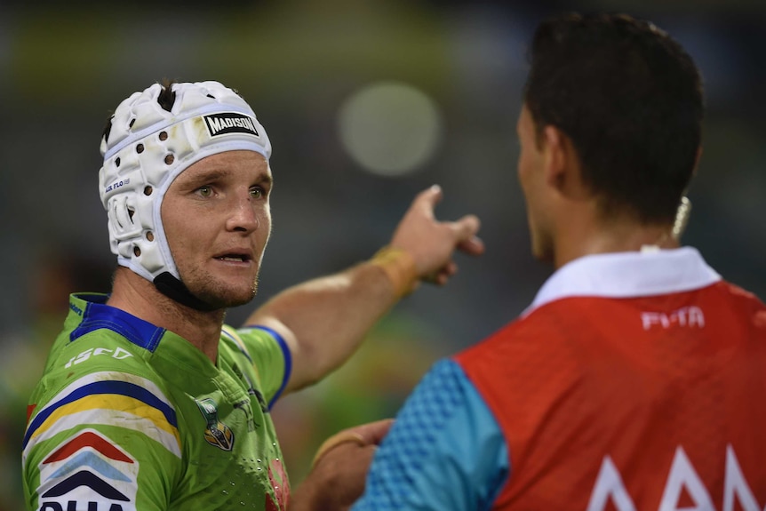 Jarrod Croker speaks to referee Henry Perenara