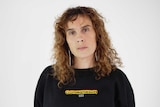 A photo of Clothing The Gap co-founder Laura Thompson with the new branding of her fashion brand with the added 's'.