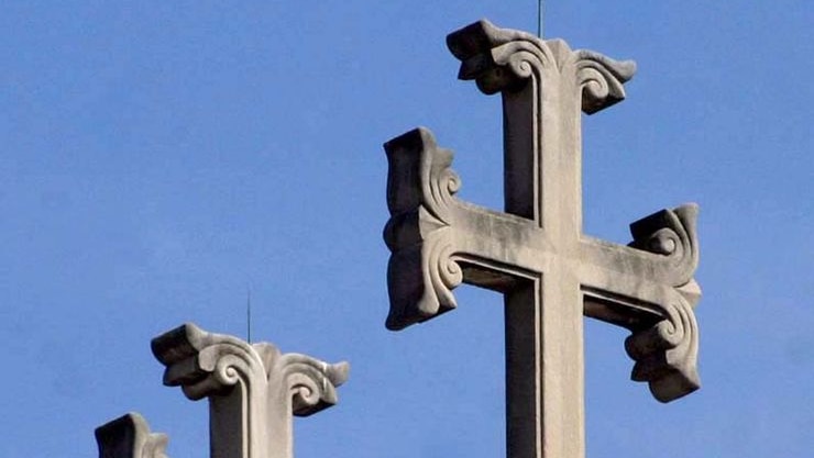 Crosses sit atop a Greek Orthodox church (www.flickr.com: dbking)