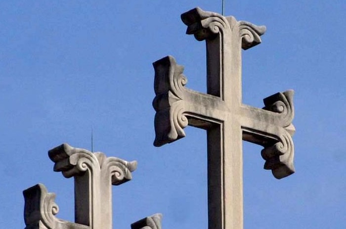 Crosses sit atop a Greek Orthodox church (www.flickr.com: dbking)