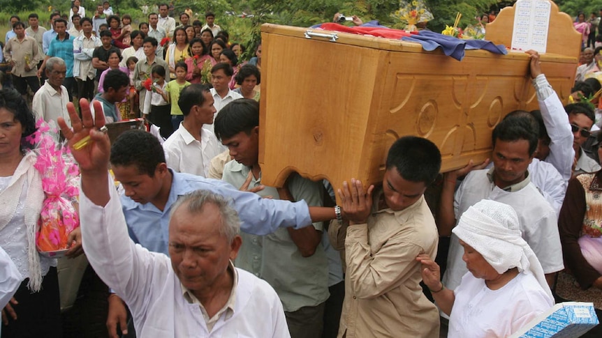 Meas Muth, the alleged Khmer Rouge naval commander leads a funeral procession for Khmer Rouge cadre Ta Mok.