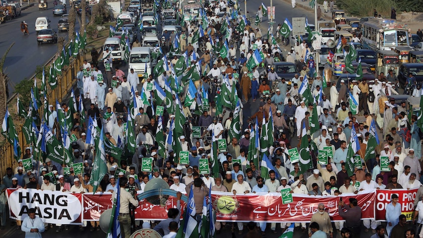 Hundreds of protestors of Jamaat-i-Islami, a Pakistani Islamist party, participate in a rally.