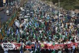 Hundreds of protestors of Jamaat-i-Islami, a Pakistani Islamist party, participate in a rally.