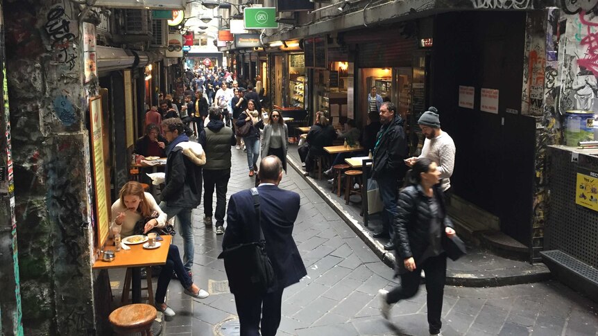 Lunchtime shoppers move through a busy lanes in Melbourne's CBD.