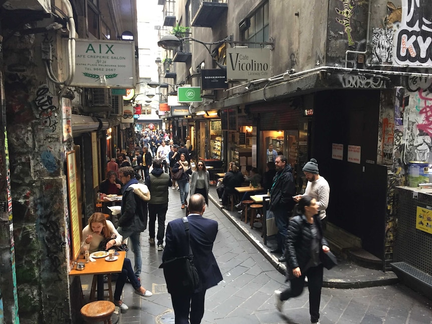Lunchtime shoppers move through a busy lanes in Melbourne's CBD.
