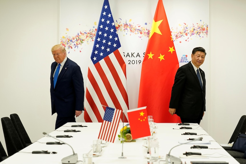 Donald Trump and Xi Jinping walk to opposite direction.