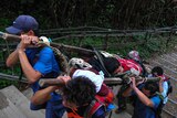 Guides carry injured off Mount Kinabalu