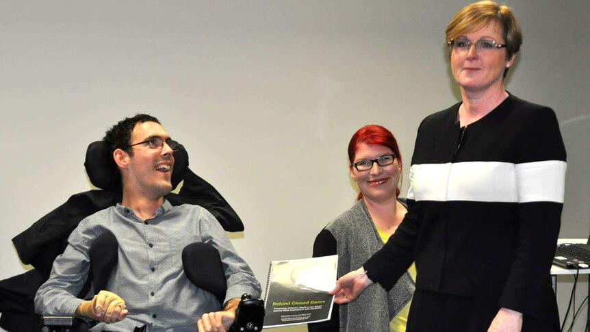 Disability campaigners Ben Keely and Samantha Connor with Senator Linda Reynolds
