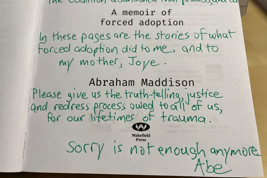 a message hand-written inside the cover of Abe Maddison's book