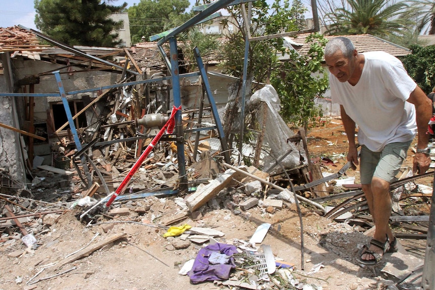 A house in Yahud, around 15kms east of Tel Aviv, was hit by a rocket fired by Gazan militants.
