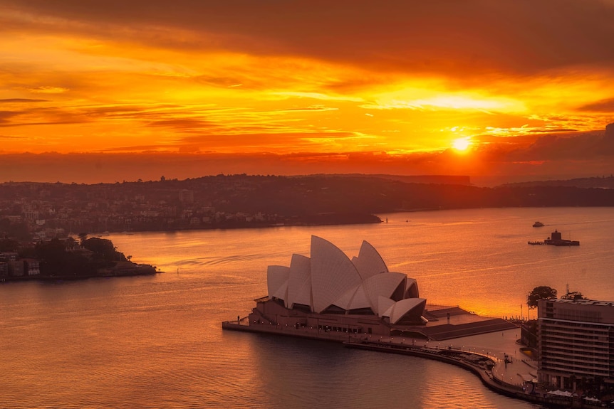 The Sydney Opera House with the sunrise