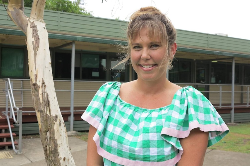 Teacher Lani Jackson stands outside a classroom at Milpera State High School in Brisbane.