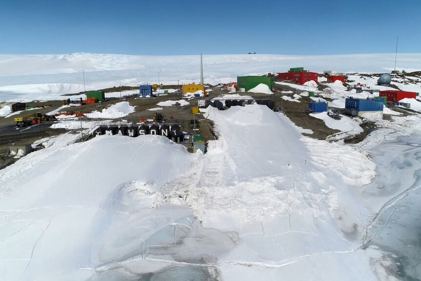 Aerial view of Mawson station surrounded by snow and ice.