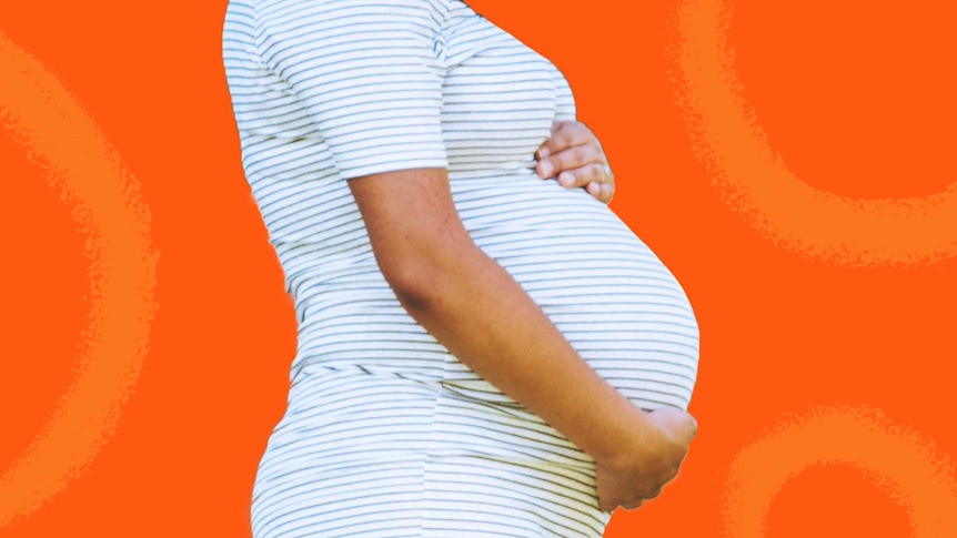 Pregnant woman holding belly for story about maternity leave discrimination