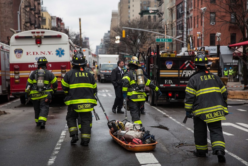 Firefighters respond to a building fire in New York City's East Village