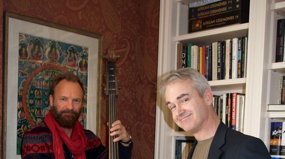 ABC correspondent Scott Bevan (right) poses with musician Sting