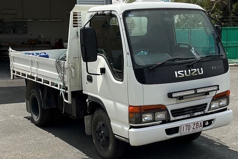 White 2000 Isuzu NKR 200 truck utility with registration 170 ZBA linked to death of Janet Guthrie on February 15 and 16