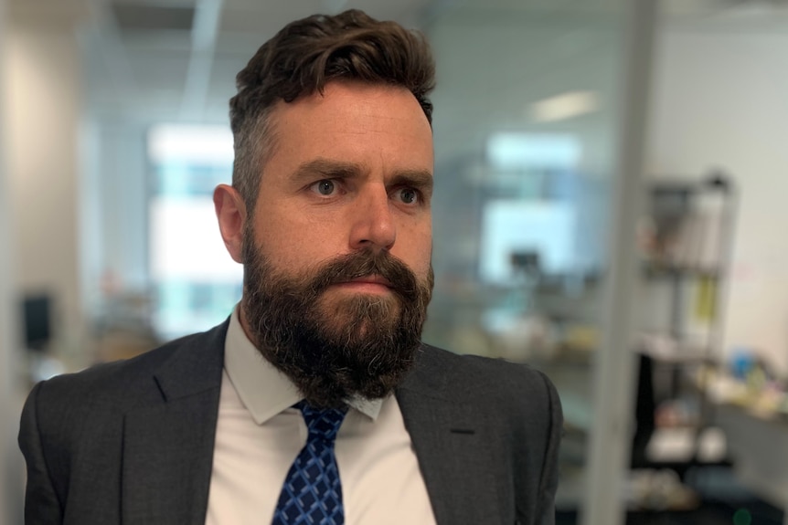 Head shot of Laird Macdonald in an office