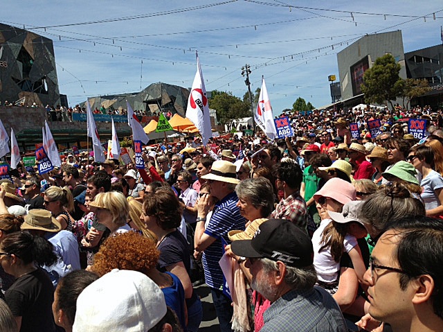 Crowds gather at Federation Square in Melbourne