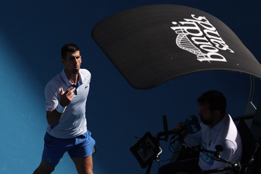 Novak Djokovic shouts at the umpire in his Australian Open semifinal.