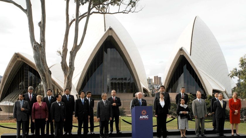 Prime Minister John Howard is joined by fellow APEC leaders as he delivers the summit's final declaration.
