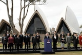 Prime Minister John Howard is joined by fellow APEC leaders as he delivers the summit's final declaration.