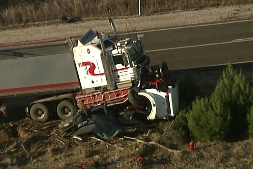The scene of a crash between a ute and a truck.