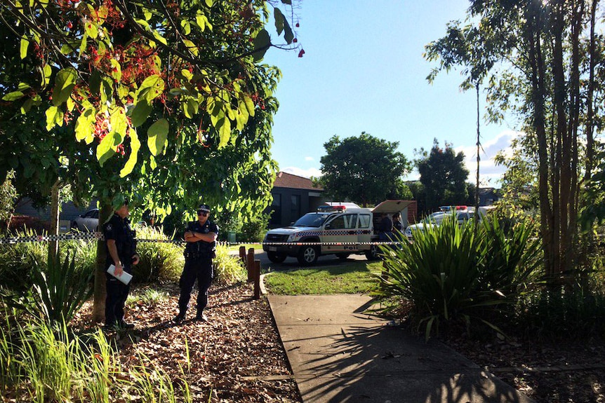 Police at a crime scene in the Brisbane suburb of Parkinson.