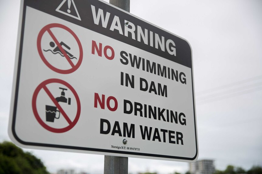 No swimming in dam sign